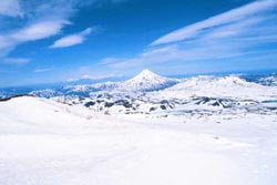 Snow fields among volcanoes