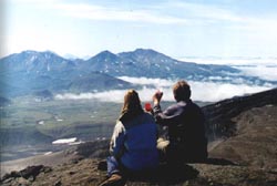 Tasting red wine on a slope of volcano